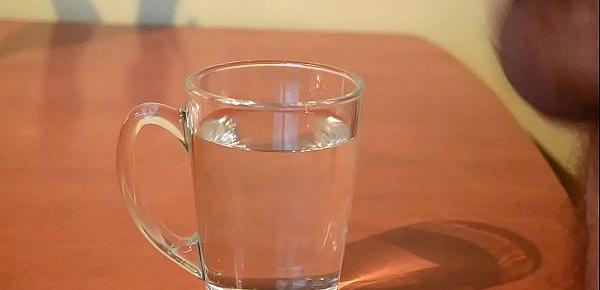  Cumming into glass of water